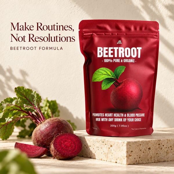 A red stand-up pouch of Beetroot Formula drink mix stands on a stone block with whole and sliced beetroots and green leaves beside it. Text on the left reads 'Make Routines, Not Resolutions' and 'BEETROOT FORMULA'.